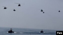 Iranian helicopters and war-boats during "Velayat-90" navy exercises in the Strait of Hormuz (file photo)