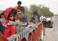 Villagers in North Waziristan flee from fighting between Pakistani security forces and Taliban militants in early March (epa)