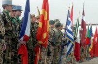 Flags of participating countries at an ISAF ceremony on 6 February (epa)