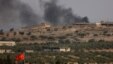 Smoke rises from the Syrian border town of Jarablus, where militant positions were attacked by Turkish forces on August 24. 