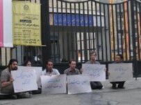 Students protesting the detention of fellow activists on July 9 (RFE/RL)