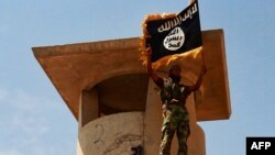 The overall theme -- that Muslims should come to Islamic State controlled lands to fight, but if they are not able to do so, they should commit acts of terror against "infidels" at home -- has been repeated numerous times in videos released by the militant group. (file photo)