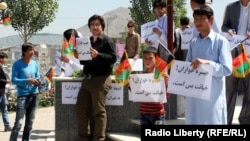 Young people demonstrate against Khomeini in Kabul on May 30.