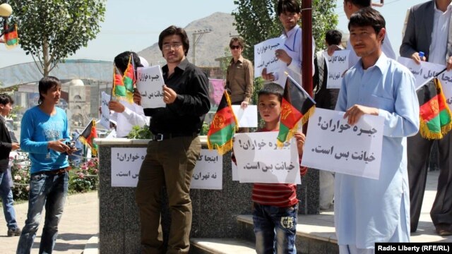 Young people demonstrate against Khomeini in Kabul on May 30.
