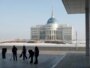 Kazakhstan - Kazakh municipal workers remove ice from the pavement in front of the Presidential palace, recently built in the new Kazakh capital Astana, 01Dec2005