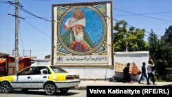 One of many billboards of the Persian poet Rumi in Mazar-e-Sharif, the capital of Afghanistan's Balkh Province, where the writer is believed to have been born.