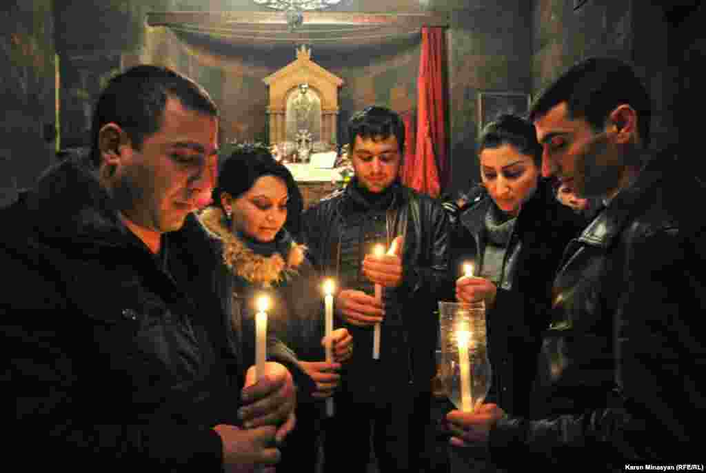 A Christmas candle liturgy inside the Khor Virap Apostolic church in Armenia.