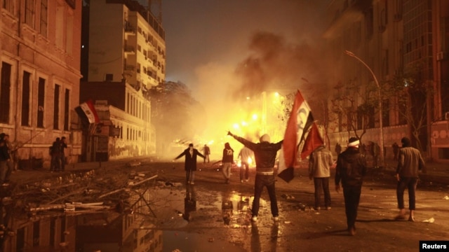 Protesters chant antigovernment slogans during a protest near the Interior Ministry in Cairo in February 2012 condemning the death of soccer fans at Port Said stadium.