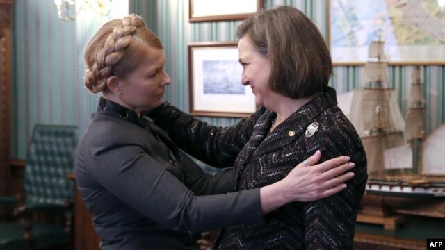 Like U.S. Assistant Secretary of State Victoria Nuland (right), former Ukrainian Prime Minister Yulia Tymoshenko (left) has been caught on tape using some rather forceful, undiplomatic language. (file photo)
