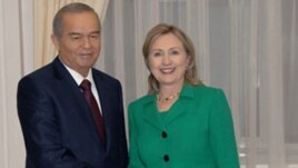 U.S. Secretary of State Hillary Clinton with Uzbek president Islam Karimov in Tashkent
