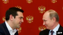 Greek Prime Minister Alexis Tsipras (left) with Russian President Vladimir Putin (file photo)