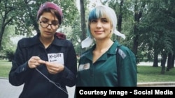 Nadezhda Tolokonnikova (right) and fellow activist Katrin Nenasheva were detained while protesting for prisoners' rights in the Russian capital.