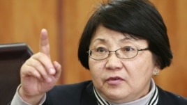 Roza Otunbaeva says she is now head of a temporary caretaker government.