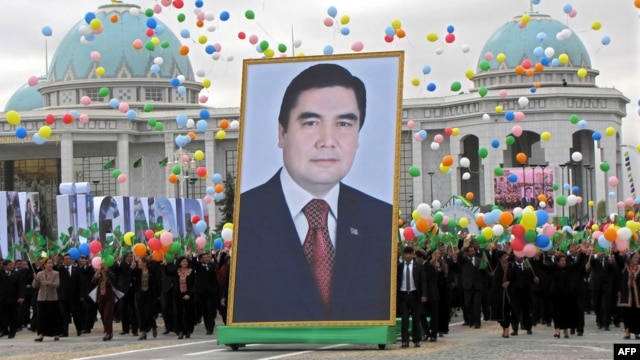People carry a giant portrait of Berdymukhammedov during Independence Day celebrations in Ashgabat in 2009.