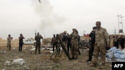 مقاتلون من قوات الحشد الشعبي في معارك تكريت