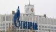 Russia -- The company logo of natural gas producer Gazprom is seen on an advertisement in front of the White House in Moscow, 08Feb2013