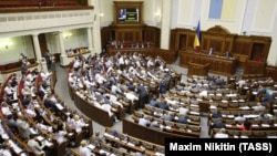 Ukrainian lawmakers passed the first reading of a controversial draft law on sanctions by a small majority on August 12.