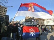 Kosovo -- An ethnic Serb waves the Serbian flag during a demonstration of about a hundred Serbs at Mitrovica bridge, 17Feb2008