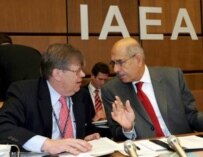 IAEA chief Muhammad el-Baradei confers with Oili Heinonen at the special Board of Governors meeting on Iran in Vienna on 2 February (epa)