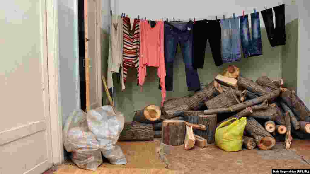 Residents keep a store of firewood for heating during the cold winter weather.