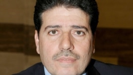  Wael al-Halqi, the former health minister, was appointed  Syria's new prime minister.