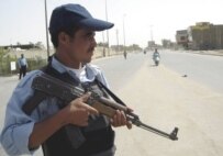 An Iraqi police officer on patrol in Karbala today (epa)