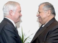Gates (left) with Iraqi President Jalal Talabani in Baghdad this morning (epa)