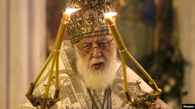 Georgian Patriarch Ilia II leads a midnight Christmas service at the Holy Trinity Cathedral in Tbilisi in January 2013.