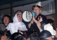 Kulov talking to opposition supporters after his release on 24 March