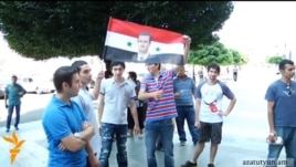 Armenia - Syrian Armenians demonstrate outside the prime minister's office in Yerevan, 19Jul2012.