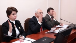 Armenia - Central Election Commission (CEC) Chairman Tigran Mukuchian (C) and other members of the CEC approve the final results of the February 18 presidential election, Yerevan, 25Feb2013.