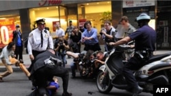Police arrest an Occupy Wall Street protester near Zuccotti Park in New York City on October 14.