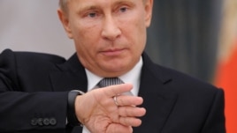 President Vladimir Putin says nationalists are taking  advantage of democratic freedoms.