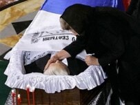 Naina Yeltsina bids farewell to her husband in Moscow today (AFP)