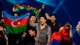 Sweden -- Azerbaijan's Farid Mammadov (C) celebrates making it to the final after the second semi-final of the 2013 Eurovision Song Contest at the Malmo Opera Hall in Malmo, 16May2013