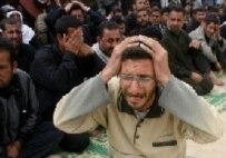 Shi'ites during Ashura observance today, when attackers killed at least 42 people in Iraq