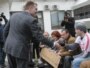 Premijer Igor Lukšić i članovi MANS-a koji su izveli performans o tome da je Vlada odgovorna za "prosjački štap" na koji je spala većina građana. Podgorica, 1. februar 2012.