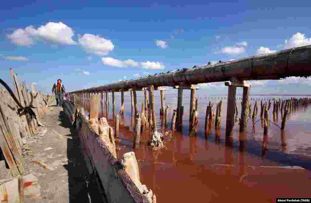 A pipeline suspended above Sasyk-Sivash Lake