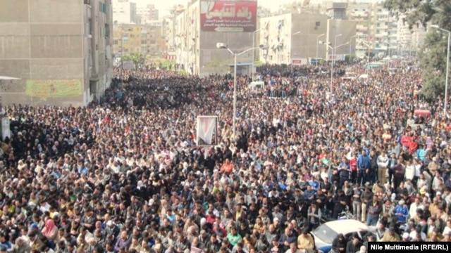 Egyptian protesters, gather in Cairo. Some of the demonstrators demanded President Muhammad Morsi's overthrow, chanting "Leave, leave."