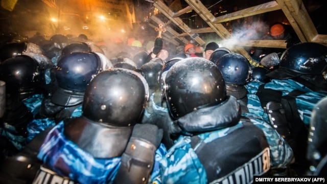 Ukrainian riot police clash with antigovernment protesters on Independence Square in Kyiv. There has been speculation in recent weeks that there is widespread discontent among Ukraine's security forces. 