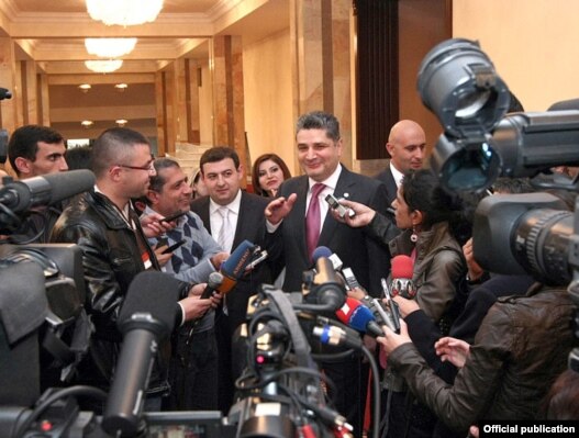 Armenian Prime Minister Tigran Sarkisian talks to the press on October 26.