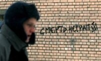 Graffiti in St. Petersburg reading: 'Death To Black Men' (AFP)