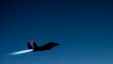 A handout picture from the U.S. Defense in September 2014 shows a U.S. Air Force F-15E Strike Eagle flying over northern Iraq early in the morning of September 23, after conducting air strikes against Islamic State targets in Syria.