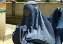 An Afghan woman wearing the burqa