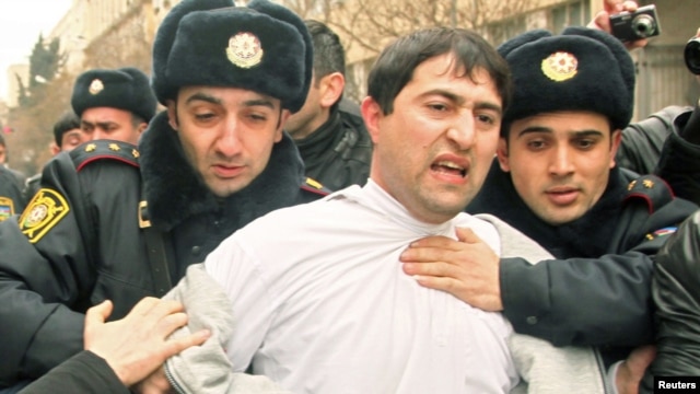 Azerbaijan -- Police detain a protester in Baku, 11Mar2011
