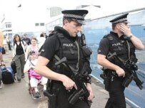 Police at Glasgow Airport today (AFP)