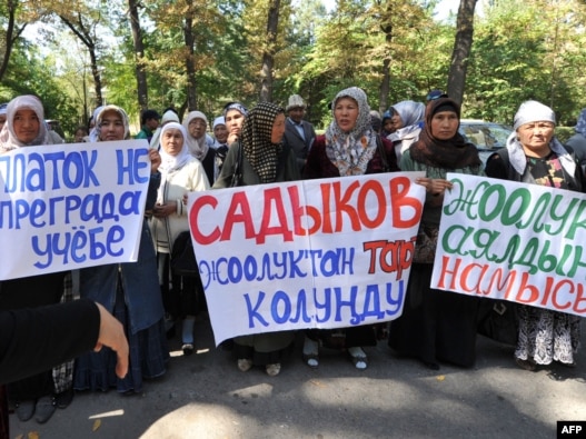 Women protest against a government ban on wearing Muslim head scarves in public schools in Bishkek on September 19.