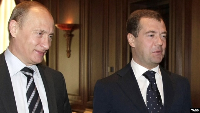 Russia's Prime Minster Vladimir Putin (left) and President Dmitry Medvedev -- more victims of the global economic crisis?