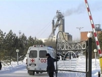 An ambulance enters the compound of the mine in Abai (AFP)