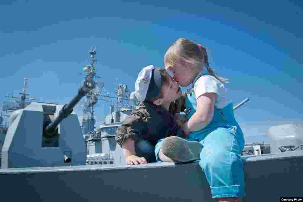 Children with Down syndrome participating in a special tour of the "HMS York," a British Royal Navy vessel docked in St. Petersburg, in July 2012. The excursion was organized for children from city orphanages and special schools.